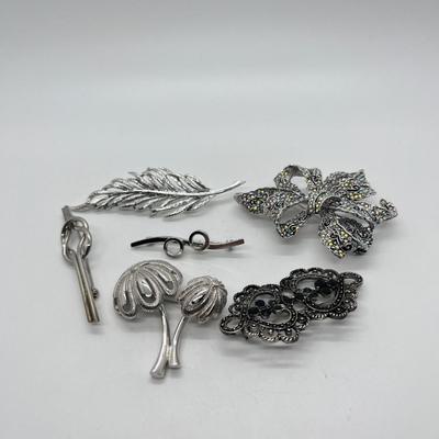 LOT 23: Six Silvertone Pins/Brooches Monet and More