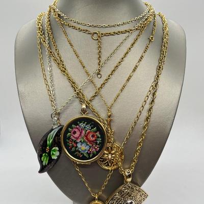 LOT 46: Goldtone Necklaces With Pendants