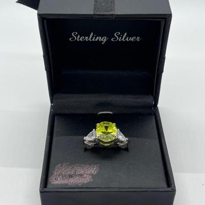 LOT 206: Sterling Silver Peridot CZ Cocktail Ring - Size 9.5