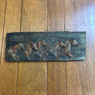 Running horses wall relief in metal