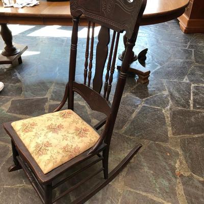 Antique carved wood armless rocker