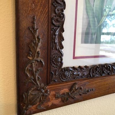 2 antique wood carved frames with prints