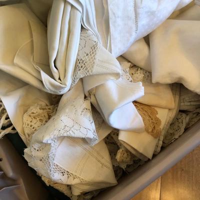 2 bins of antique tablecloths and napkins