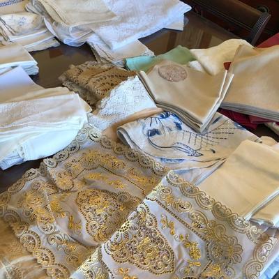 2 bins of antique tablecloths and napkins