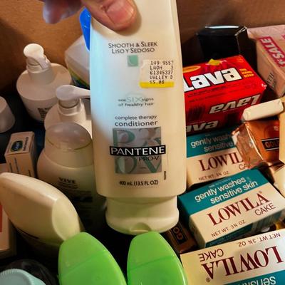 Box of Soaps and Lotions and Shampoos. 