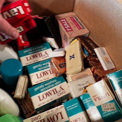 Box of Soaps and Lotions and Shampoos. 