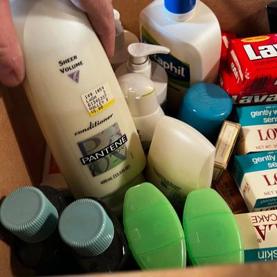 Box of Soaps and Lotions and Shampoos. 