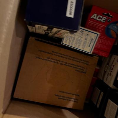 2 Boxes of Band-Aids, Surgical and Ace Plus Needles. 