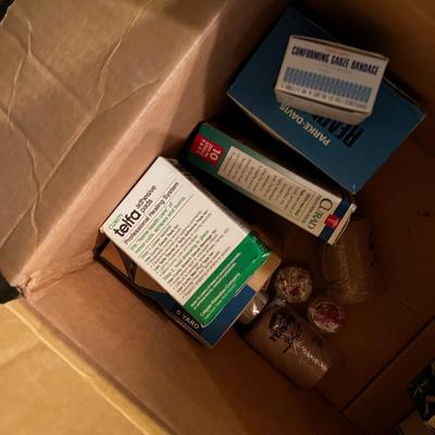 2 Boxes of Band-Aids, Surgical and Ace Plus Needles. 