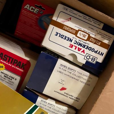 2 Boxes of Band-Aids, Surgical and Ace Plus Needles. 