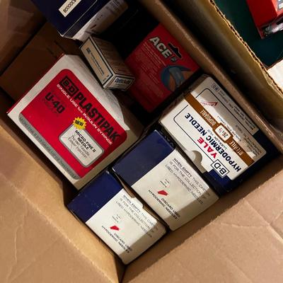2 Boxes of Band-Aids, Surgical and Ace Plus Needles. 