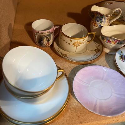 Shelf full of Mixed China; Tea cup, Cream & Sugar Plates etc.