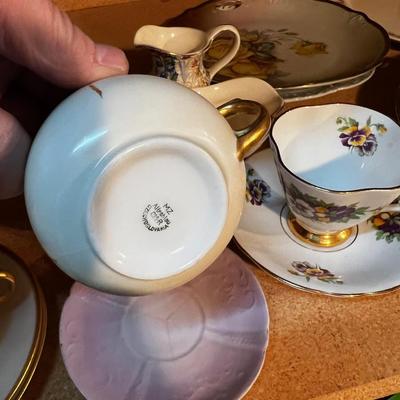 Shelf full of Mixed China; Tea cup, Cream & Sugar Plates etc.