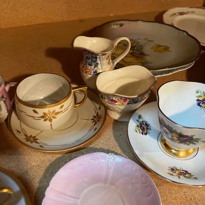 Shelf full of Mixed China; Tea cup, Cream & Sugar Plates etc.