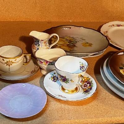Shelf full of Mixed China; Tea cup, Cream & Sugar Plates etc.