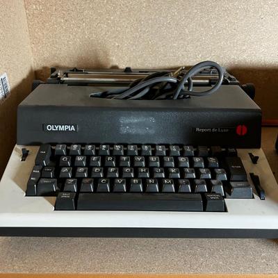 Olympia Report DE lux 