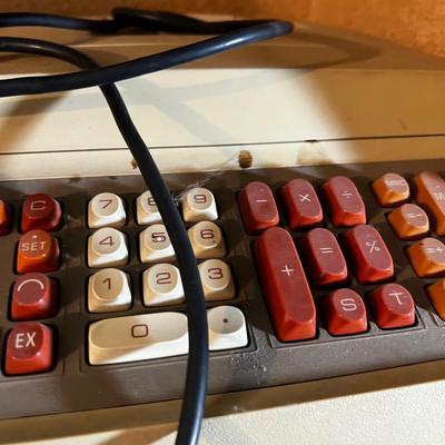 Shelf Full of old Electric Adding Machines; Victor 