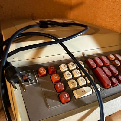 Shelf Full of old Electric Adding Machines; Victor 