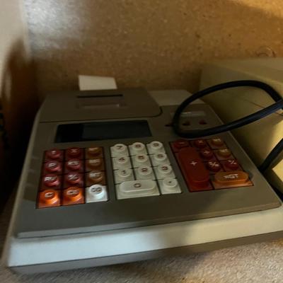 Shelf Full of old Electric Adding Machines; Victor 