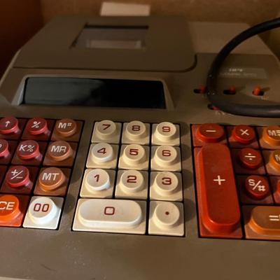 Shelf Full of old Electric Adding Machines; Victor 