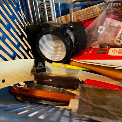 Painting supplies in a blue basket
