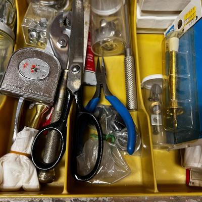 Tray with Tools, Picture hooks, Repair Hammer and items. 
