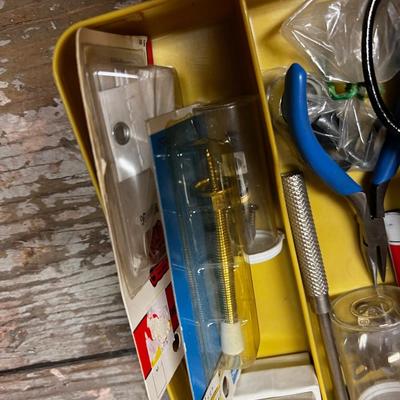 Tray with Tools, Picture hooks, Repair Hammer and items. 