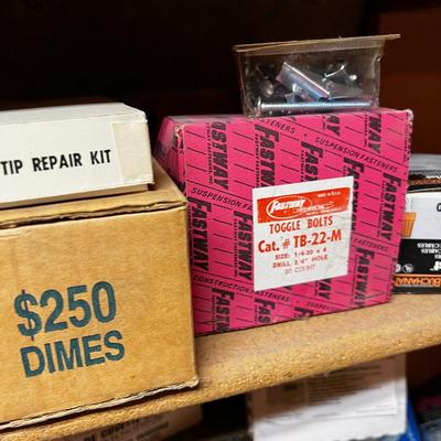 Shelf Full of Parts and bits: Sandpaper, Hardware, Screws etc.