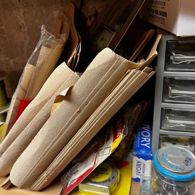 Shelf Full of Parts and bits: Sandpaper, Hardware, Screws etc.