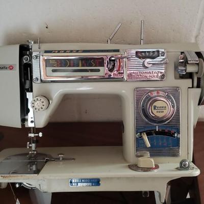 Vintage  Morse sewing machine in cabinet Model 4400