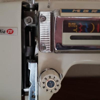 Vintage  Morse sewing machine in cabinet Model 4400