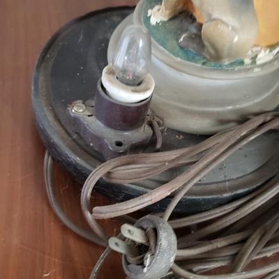 Antique Saint Roch light with chips