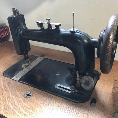 Vintage sewing machine and new home metal base