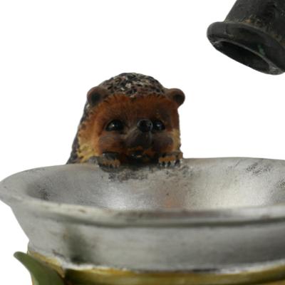 Large Water Spout and Hedgehog Figurine
