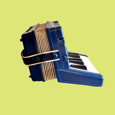 Vintage 1955 Emenee Keyboard Accordian Toy