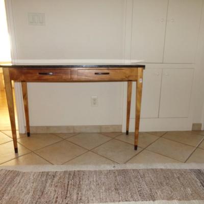 Marble-top long table with two drawers.