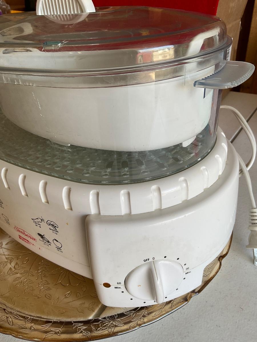 Sunbeam Oster Instant Steamer with serving plate.