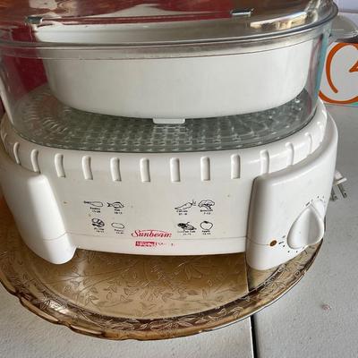 Sunbeam Oster Instant Steamer with serving plate.