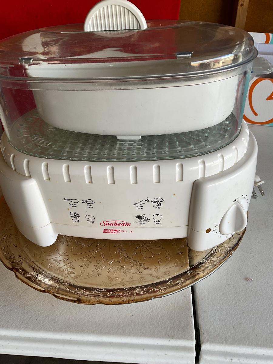 Sunbeam Oster Instant Steamer with serving plate.