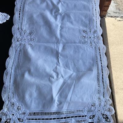 4â€™ table runner and Hand Crochet Doilies.