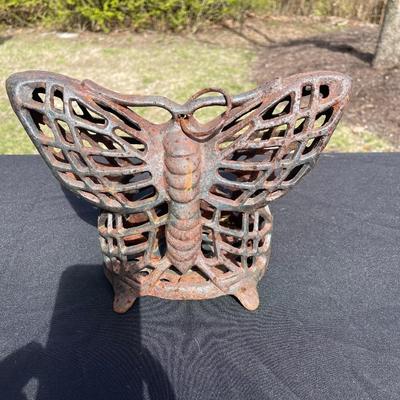 Lot 31 - Heavy cast iron butterfly candle holder