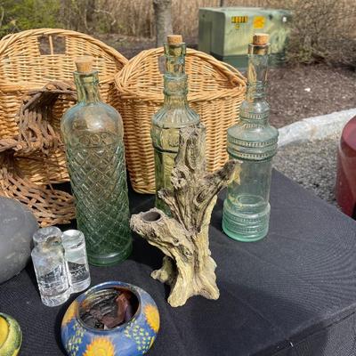 Lot 33 - Baskets, glass bottles, resin wall plaques and more