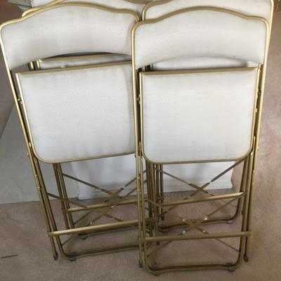 4 padded guest chairs