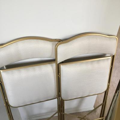 4 padded guest chairs