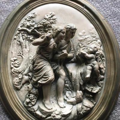 two Romantic chalkware Italian wall plaques