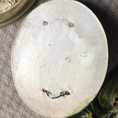 two Romantic chalkware Italian wall plaques