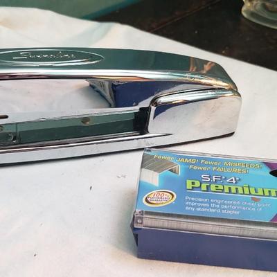 Silver Chrome Swingline Stapler with box of staples