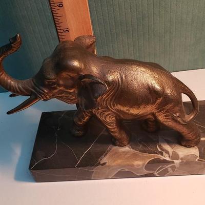 Heavy elephant bookends broken tusk