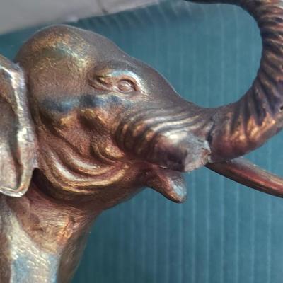 Heavy elephant bookends broken tusk