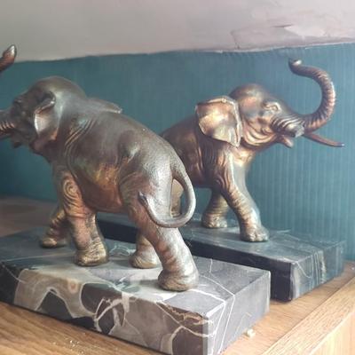 Heavy elephant bookends broken tusk